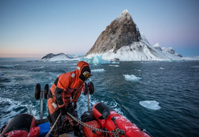 Pontoon cruise in the Arctic fjord - between glaciers, icebergs and mountains